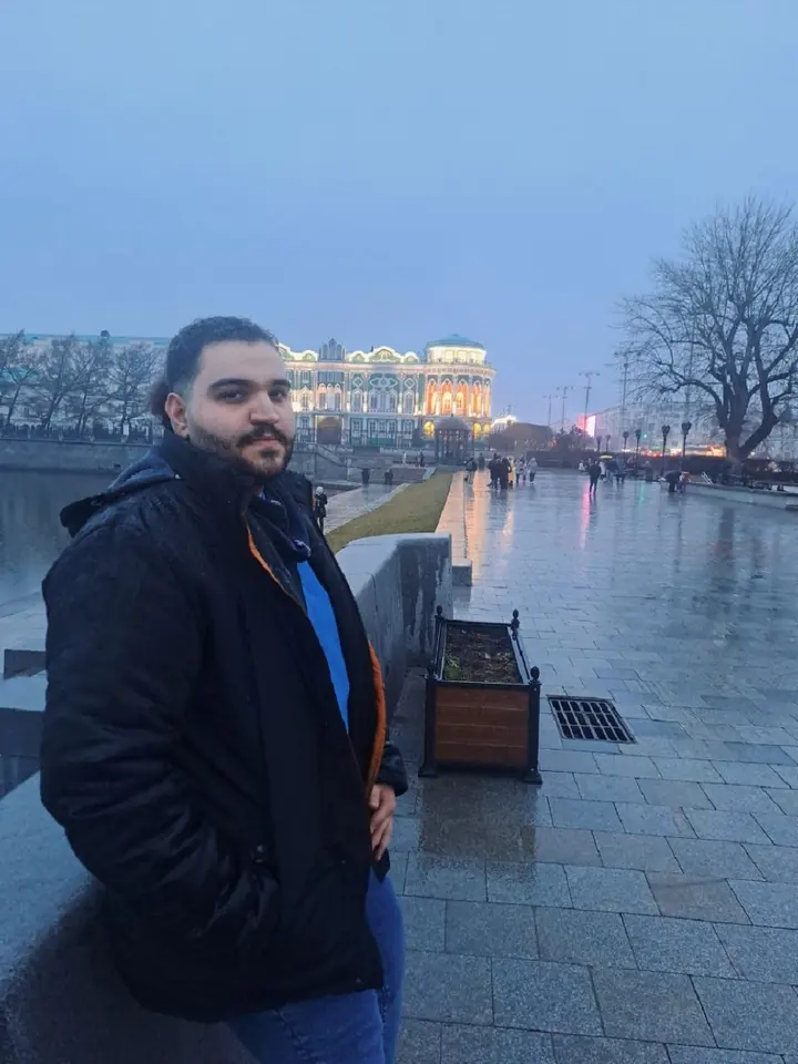 AmirHossein Abdollahi by the city pond of Yekaterinburg during the BRICS Hi-Tech 2025 trip to Russia